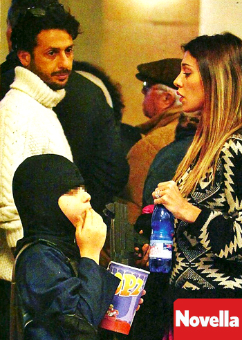 Fabrizio Corona e Belen Rodriguez a spasso con una 'testa di cuoio'