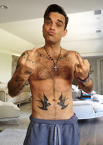 Robbie Williams: "Grasso a chi?"