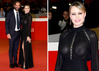 Anna Falchi sul red carpet col nuovo compagno e senza reggiseno: foto
