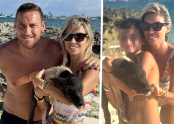 Francesco Totti e Noemi Bocchi coccolano un maialino in spiaggia durante le vacanze alla Bahamas: guarda